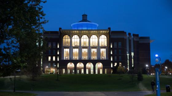 Image of William T. Young Library at night
